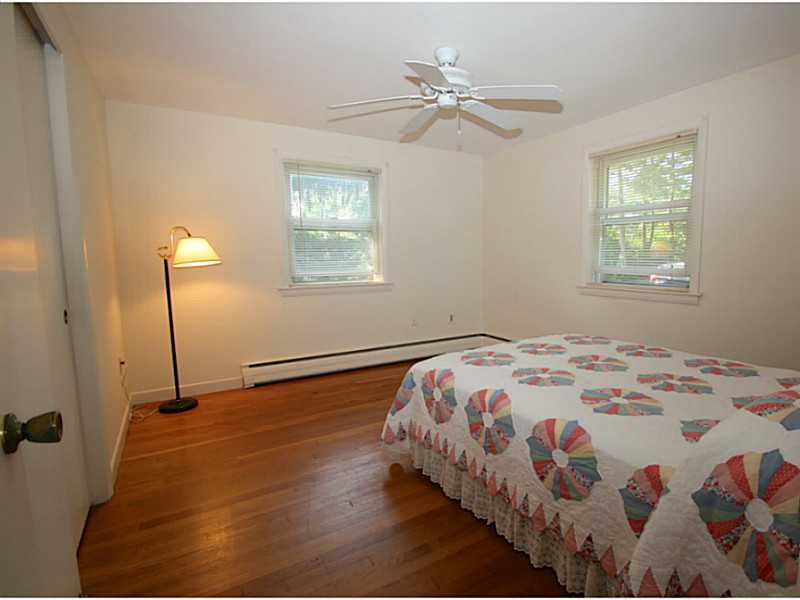 149 Wampanoag Road Warwick, RI 02818 - Photo 8 of 17 Master Bedroom. All 3 bedrooms have hardwood floors and ceiling fans.
