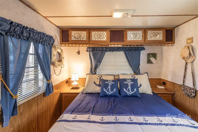 a view of bathroom with a tub shower and a sink