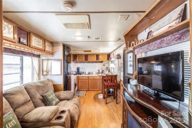 a view of a house with backyard and porch