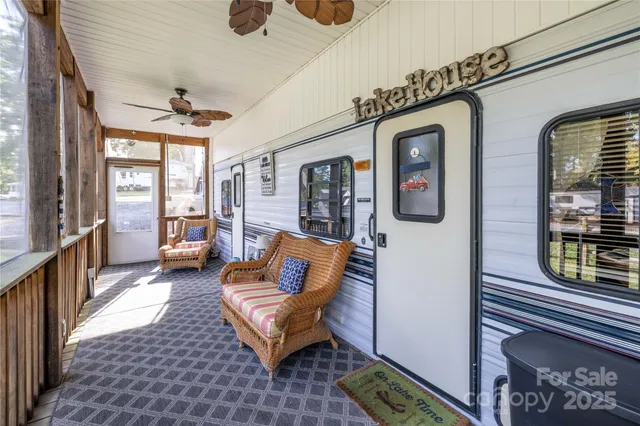 a kitchen with stainless steel appliances granite countertop a sink and a white cabinets