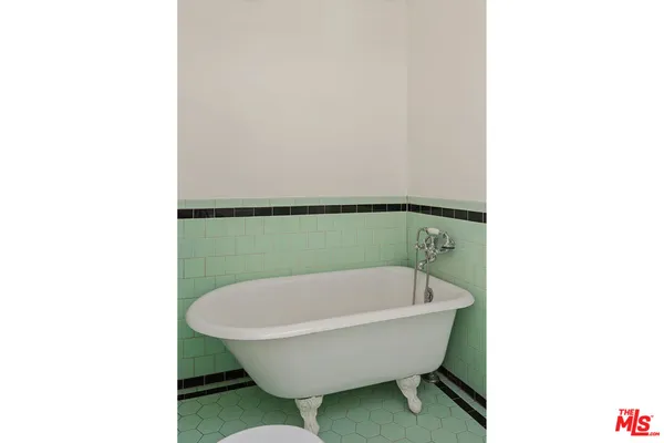 a view of a bathtub in a bathroom
