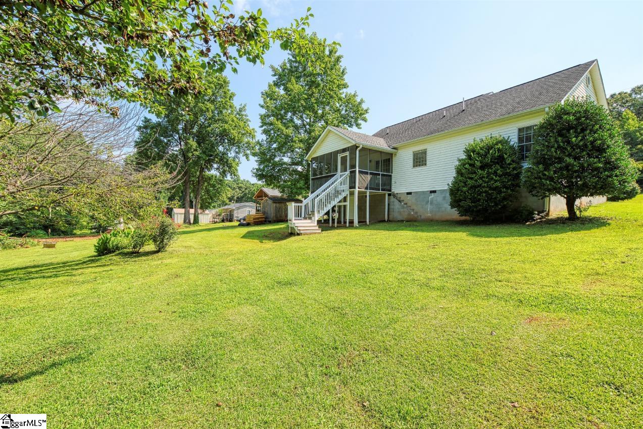 337 Bobo Road Wellford, SC 29385 - Photo 31 of 35 Large yard to play with Fido...plant a garden...play some sports...