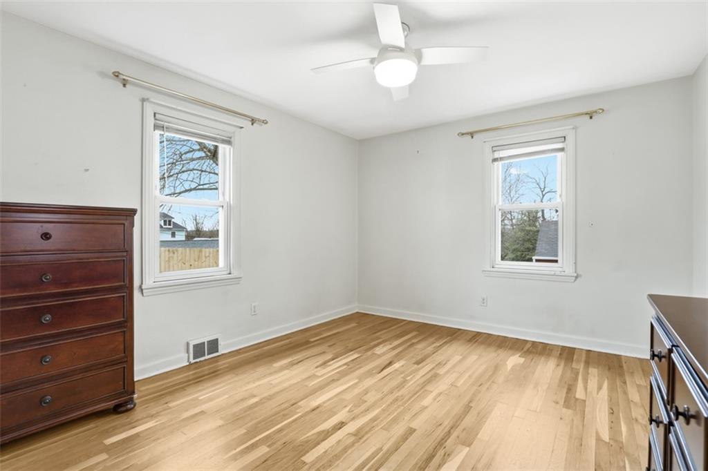 513 Lombard Street Irwin, PA 15642 - Photo 13 of 31 a view of an empty room with a window and dresser