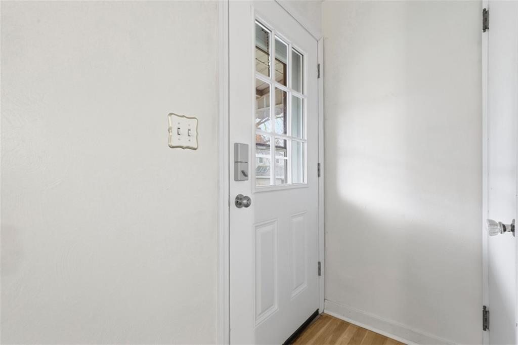 513 Lombard Street Irwin, PA 15642 - Photo 21 of 31 a view of a hallway with wooden floor