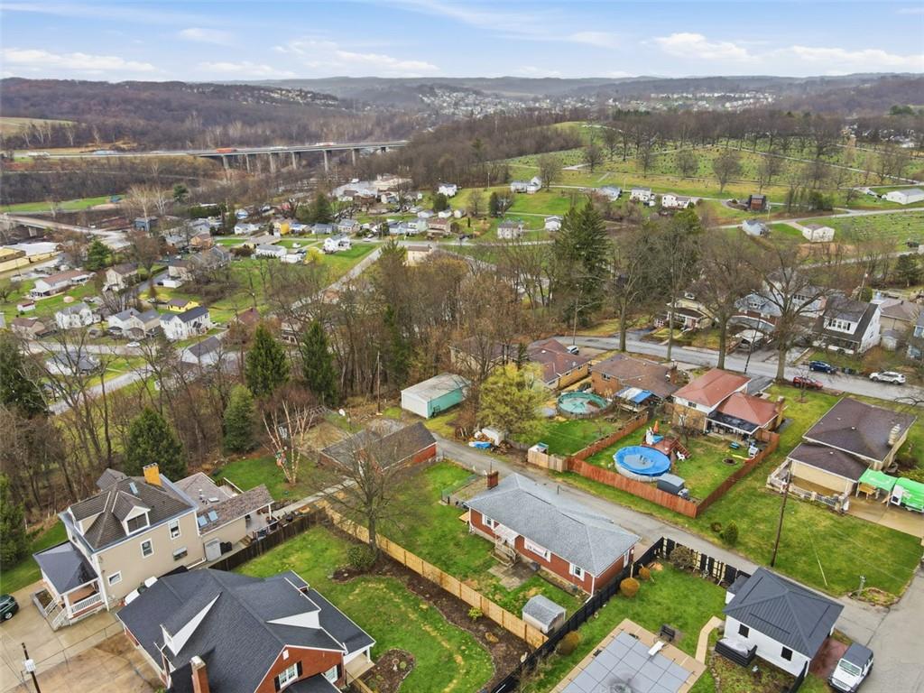 513 Lombard Street Irwin, PA 15642 - Photo 28 of 31 an aerial view of lake and residential houses with outdoor space