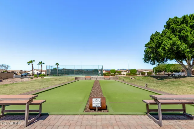 a view of balcony with furniture