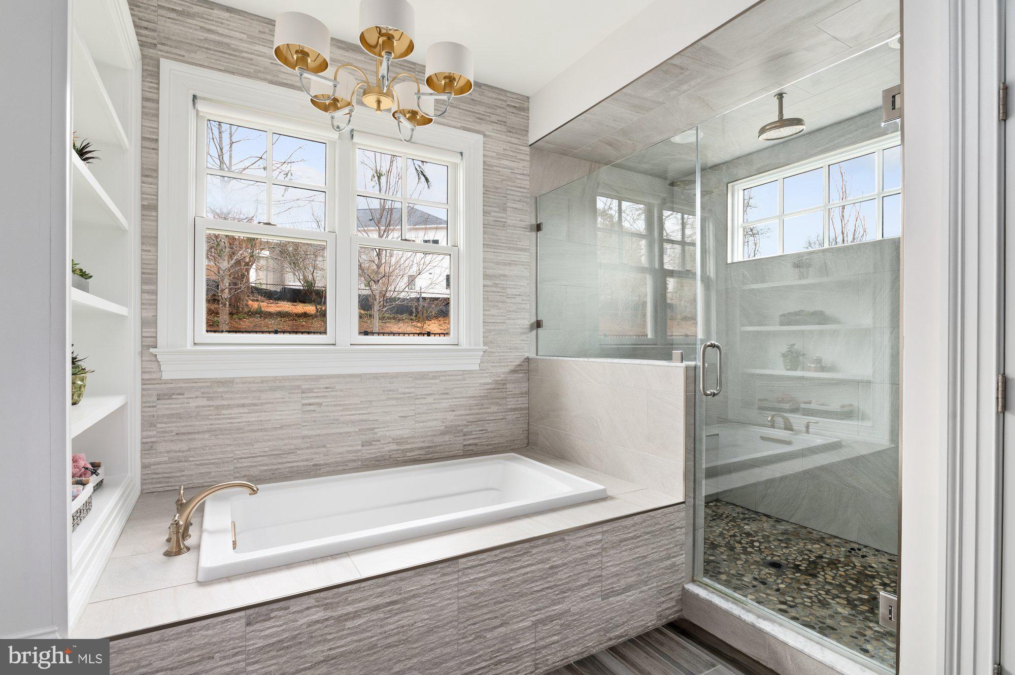 1610 Brookside Road McLean, VA 22101 - Photo 26 of 51 a bathroom with a tub a sink and a window
