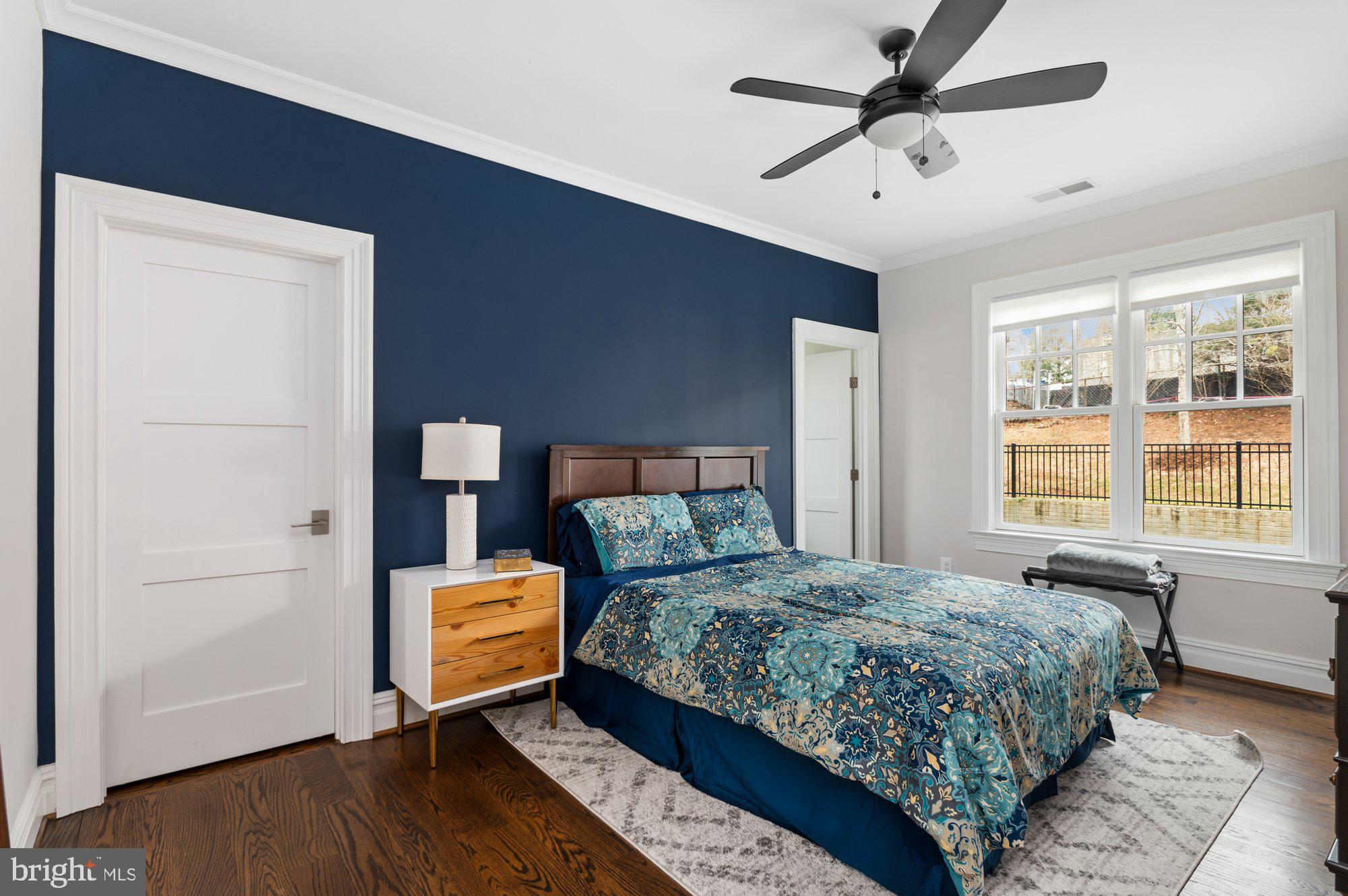 1610 Brookside Road McLean, VA 22101 - Photo 32 of 51 a bedroom with a bed and a window