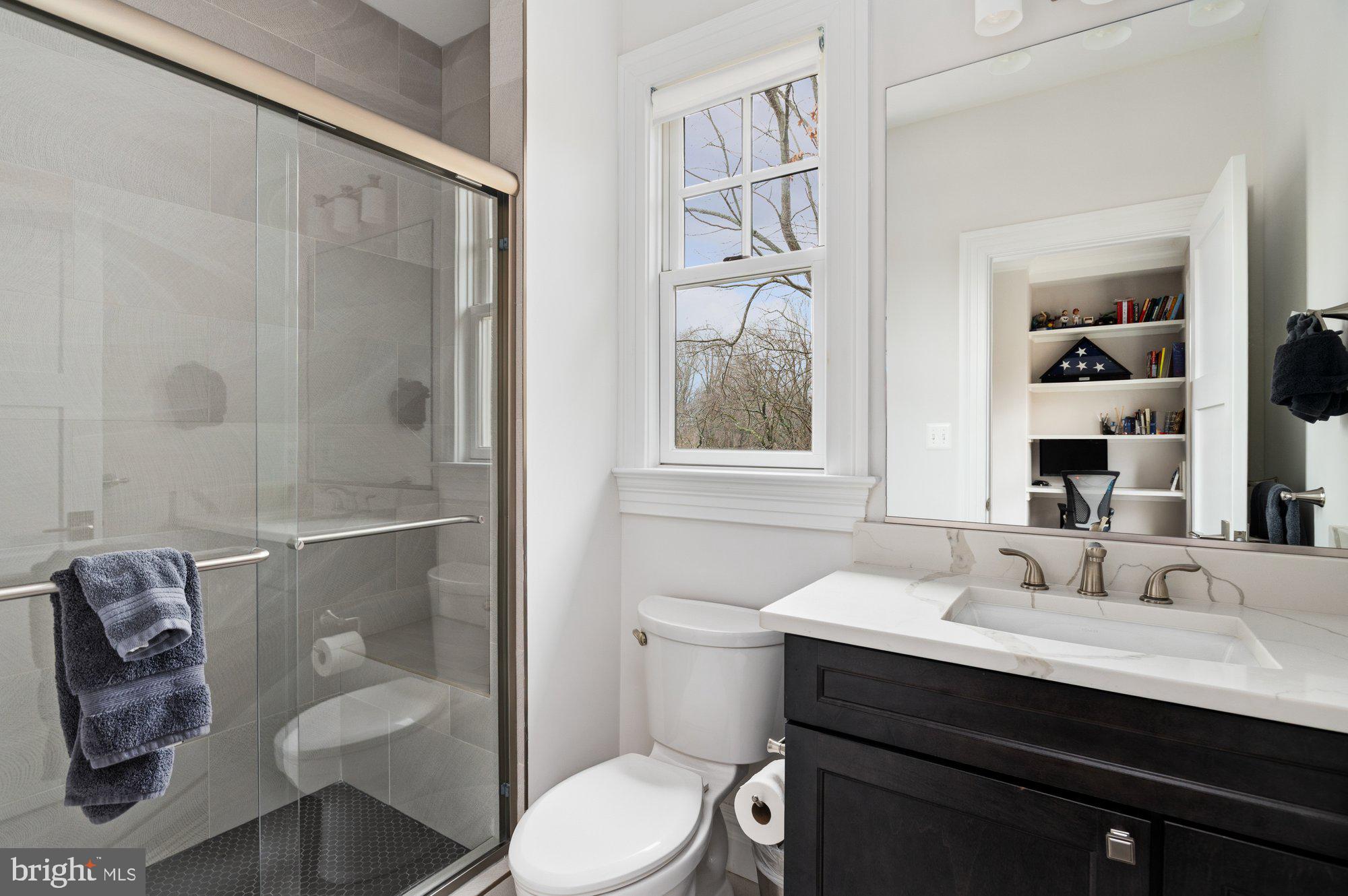1610 Brookside Road McLean, VA 22101 - Photo 33 of 51 a bathroom with a sink toilet and shower