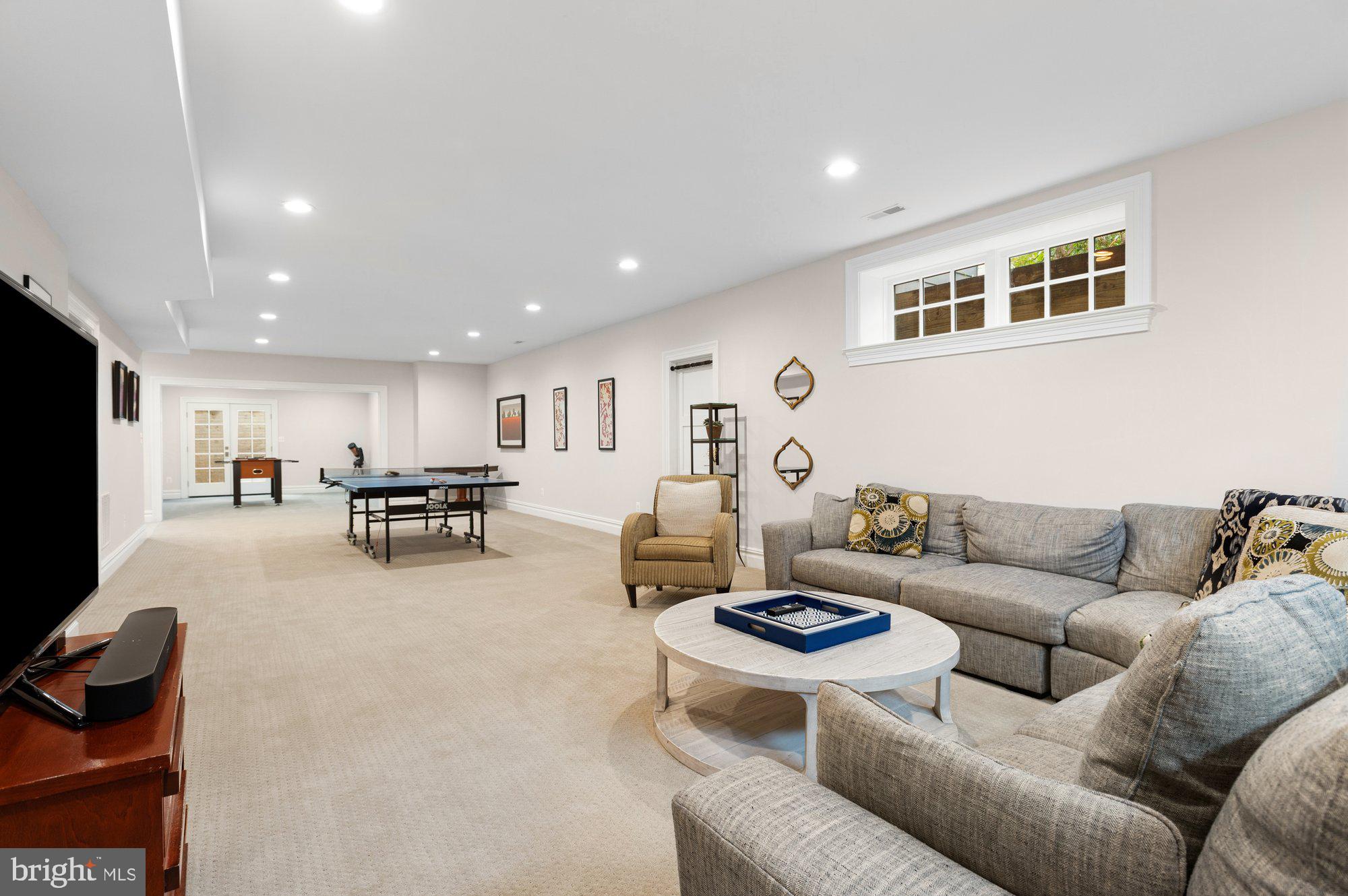 1610 Brookside Road McLean, VA 22101 - Photo 37 of 51 a living room with furniture and a flat screen tv