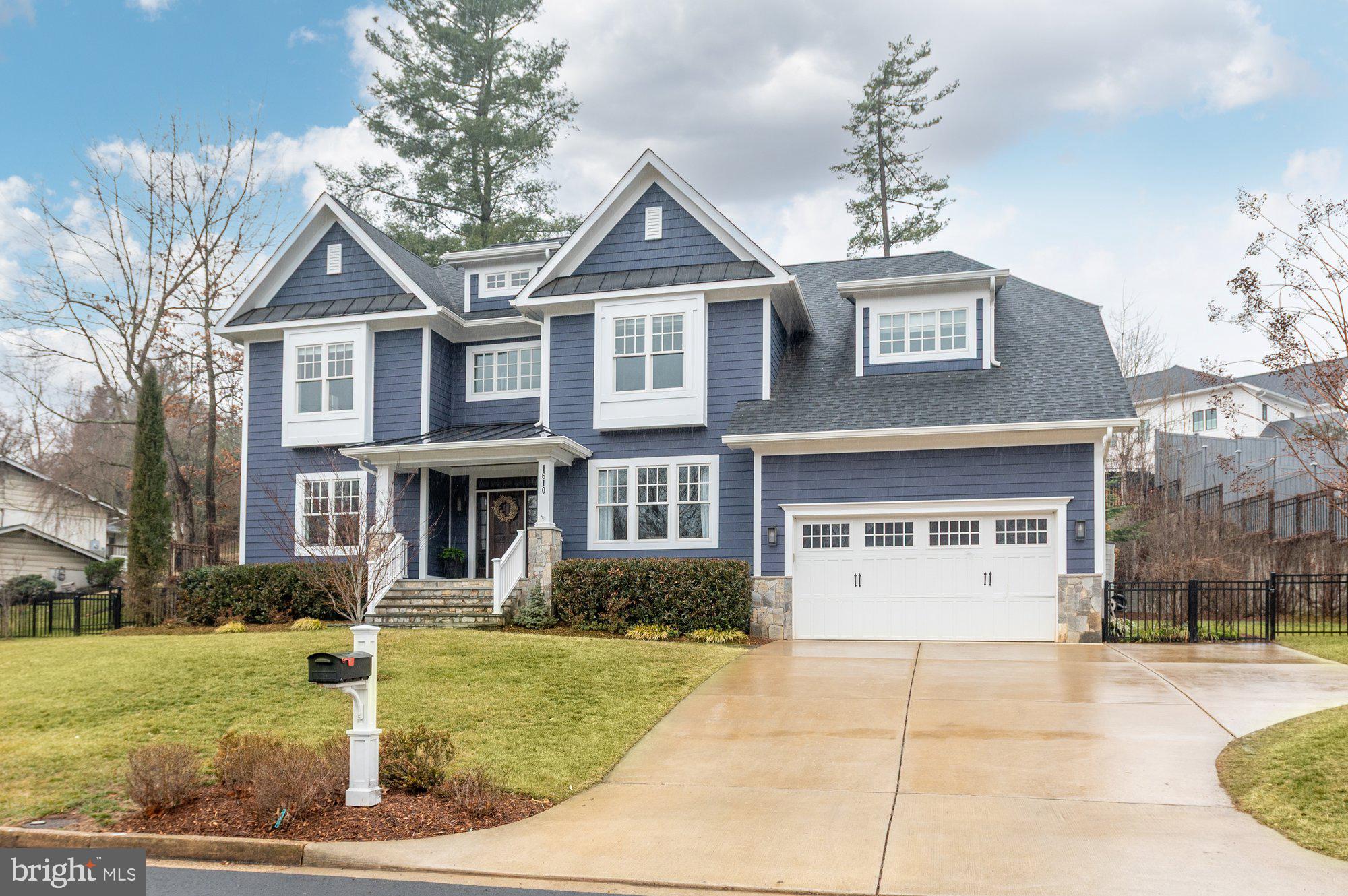 1610 Brookside Road McLean, VA 22101 - Photo 46 of 51 a front view of a house with garden
