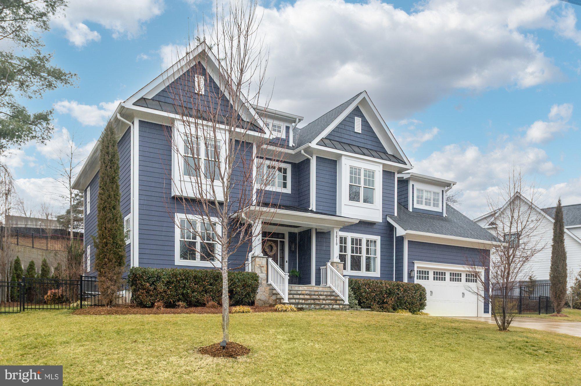 1610 Brookside Road McLean, VA 22101 - Photo 47 of 51 a front view of a house with a yard