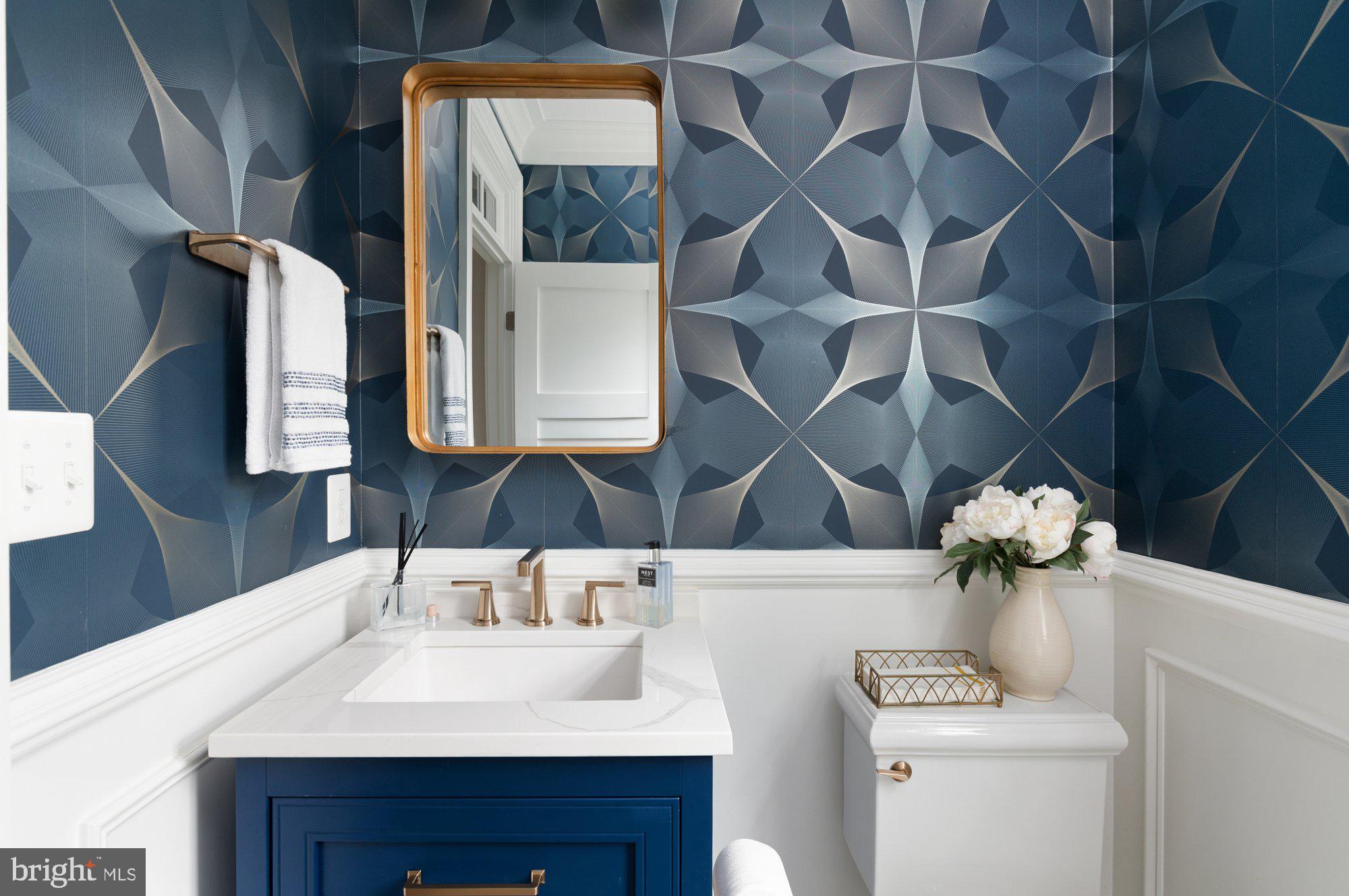 1610 Brookside Road McLean, VA 22101 - Photo 8 of 51 a bathroom with a sink and a mirror