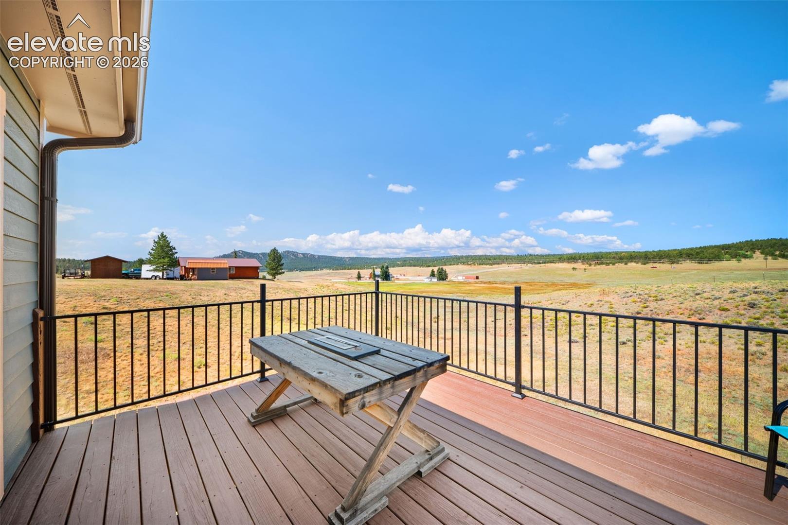 351 High Pasture Road Florissant, CO 80816 - Photo 25 of 42 Expansive valley and mountain views from the rear deck.