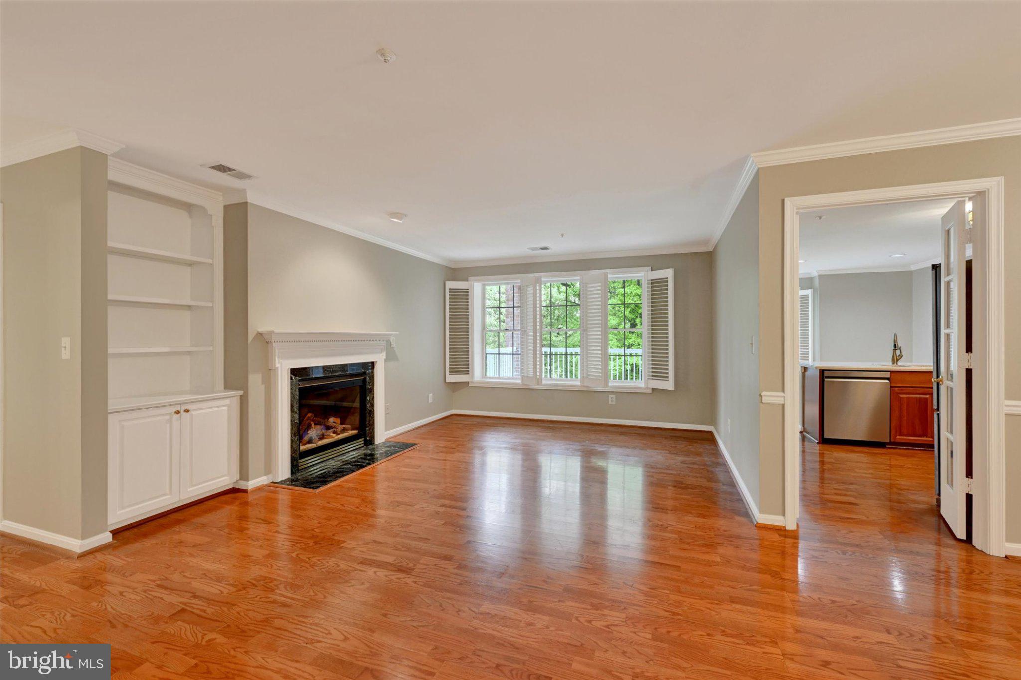 12310 Rosslare Ridge Road, Unit 405 Lutherville-Timonium, MD 21093 - Photo 4 of 36 Spacious living area with natural light.