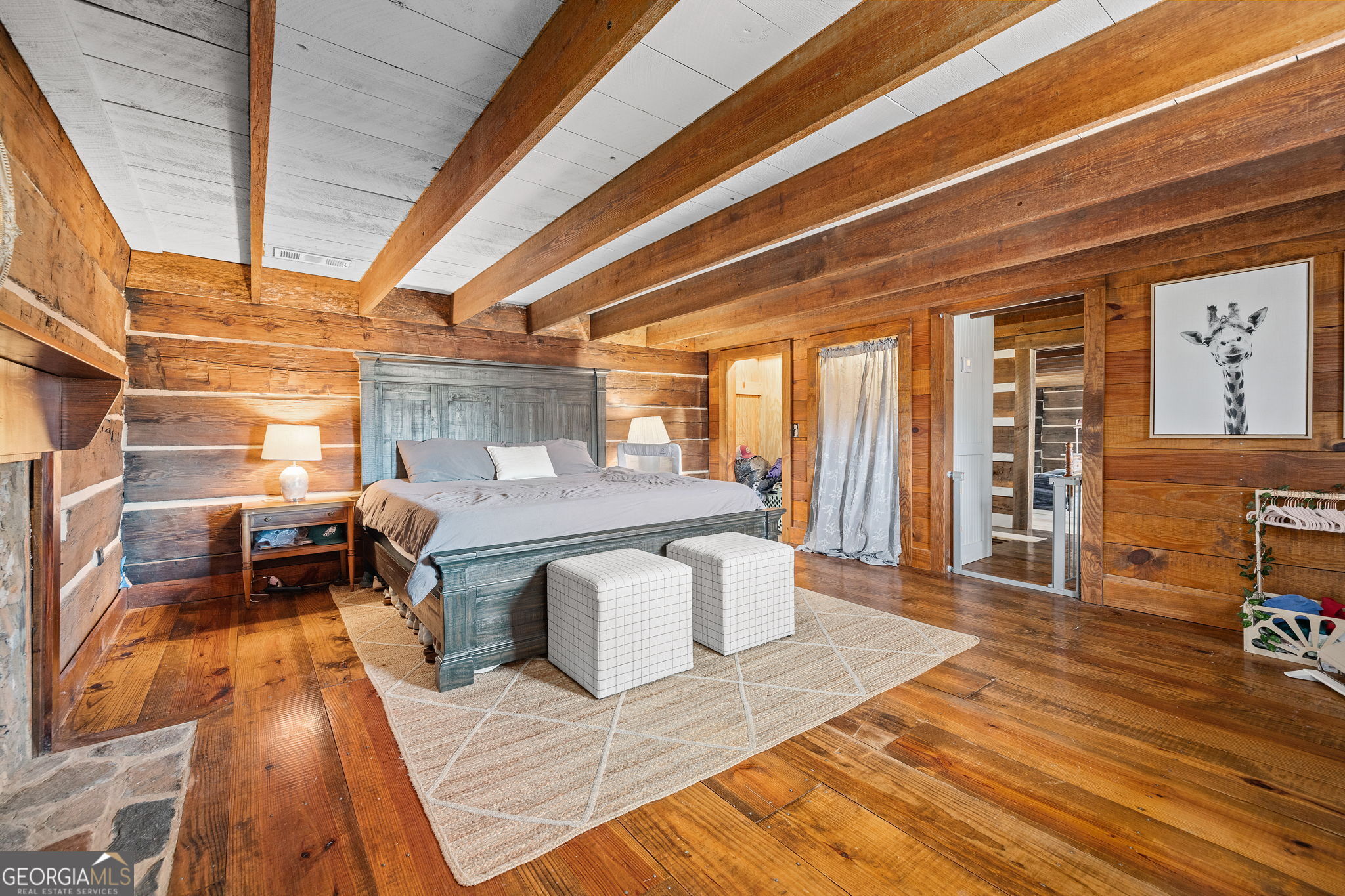 28 Ayersville Road Toccoa, GA 30577 - Photo 20 of 29 a living room with a couch wooden floor and a table