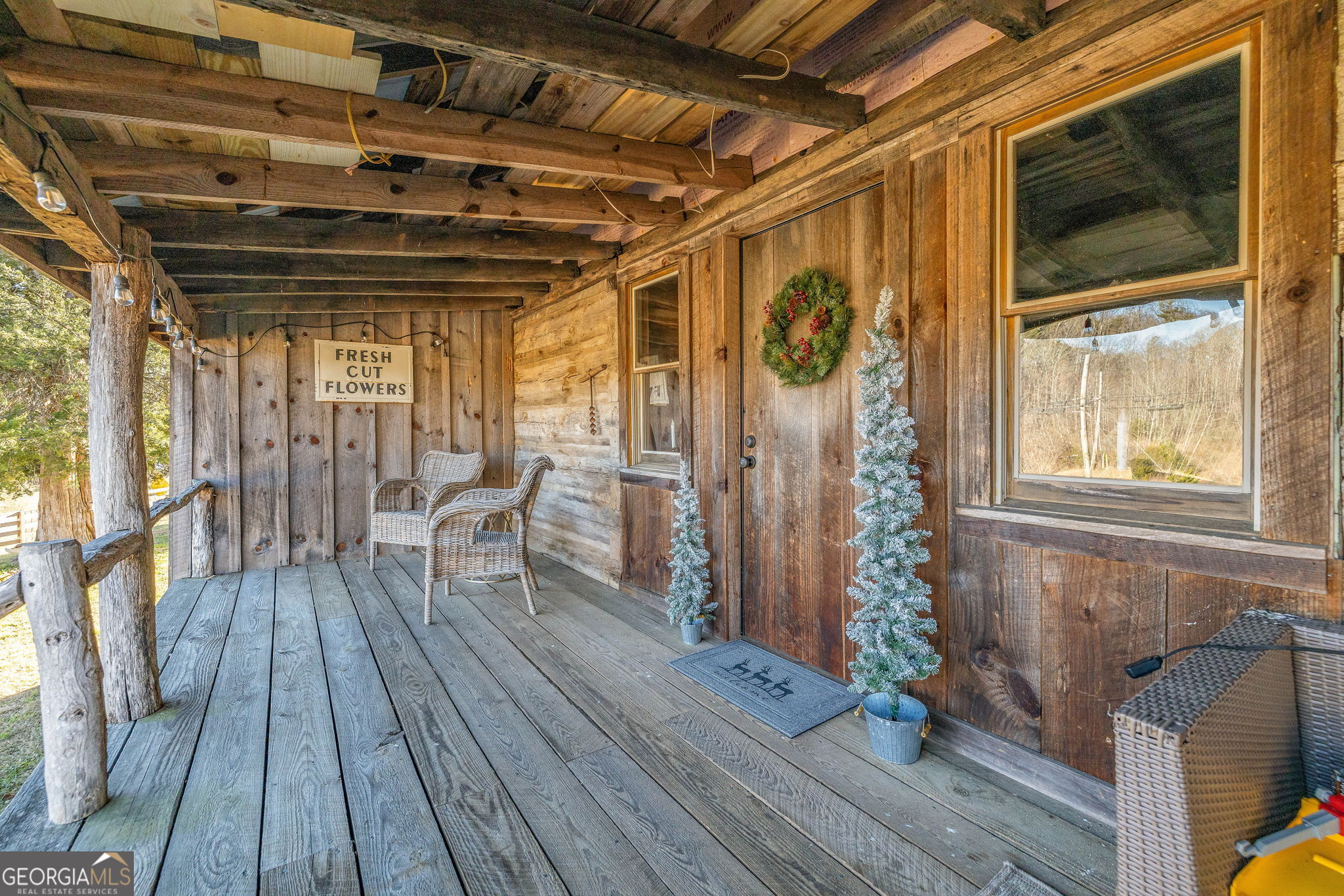 28 Ayersville Road Toccoa, GA 30577 - Photo 3 of 29 a view of outdoor space with wooden floor and seating