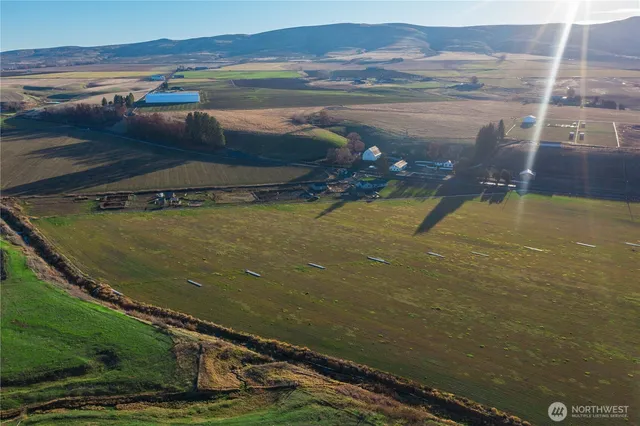 a view of an ocean and a mountain