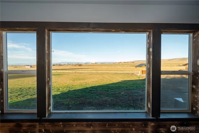 a view of a lake from a room