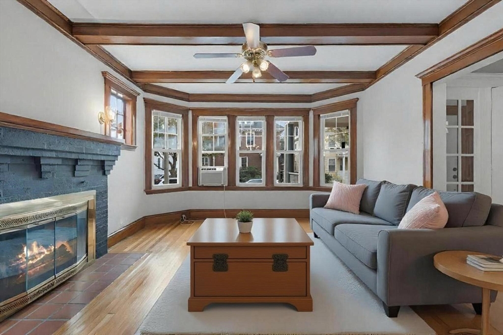 65-67 Halifax Street Boston, MA 02130 - Photo 2 of 21 a living room with furniture and a fireplace