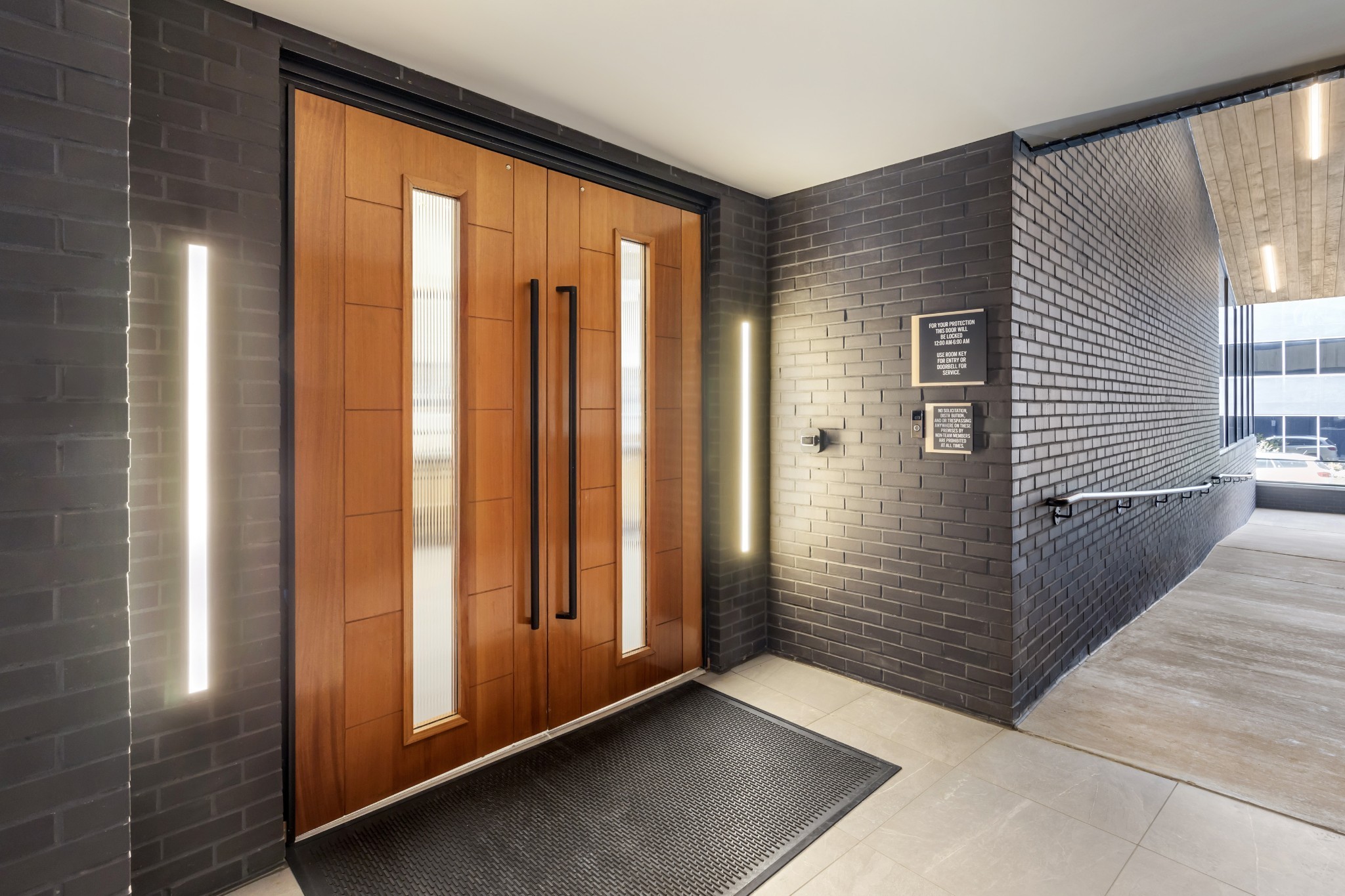 50 Music Square West, Unit 114 Nashville, TN 37203 - Photo 3 of 83 a view of a hallway with wooden floor and staircase