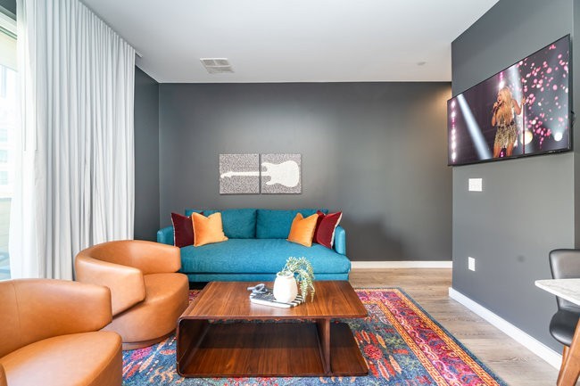 50 Music Square West, Unit 114 Nashville, TN 37203 - Photo 41 of 83 a living room with furniture and a rug