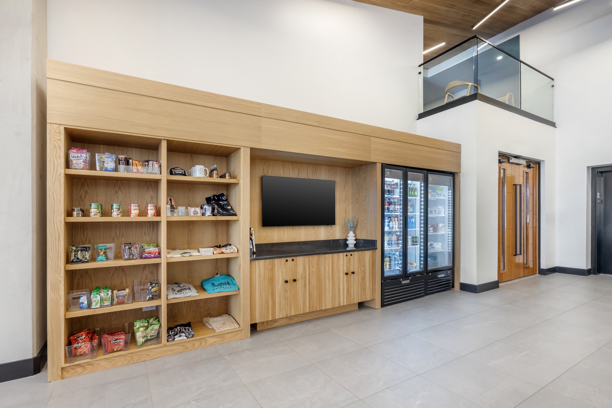 50 Music Square West, Unit 114 Nashville, TN 37203 - Photo 7 of 83 a view of an empty room with window and cabinet