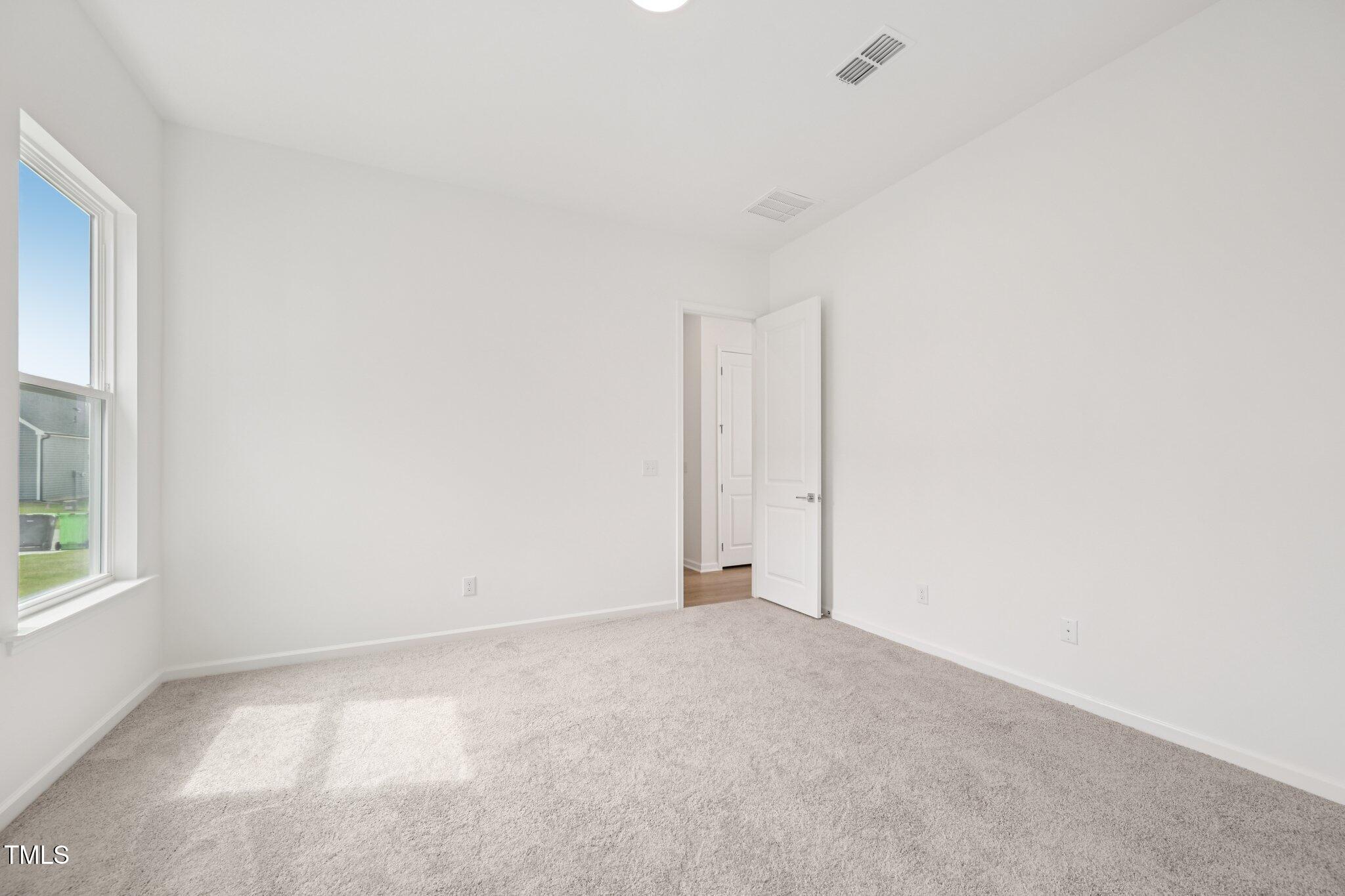 2874 Quarry Road, Unit 165 Rolesville, NC 27571 - Photo 24 of 42 Primary Bedroom