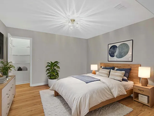 a view of a patio with a table chairs and a backyard