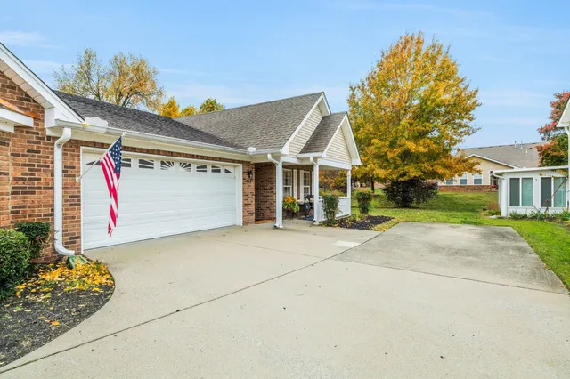 a view of a house with a street