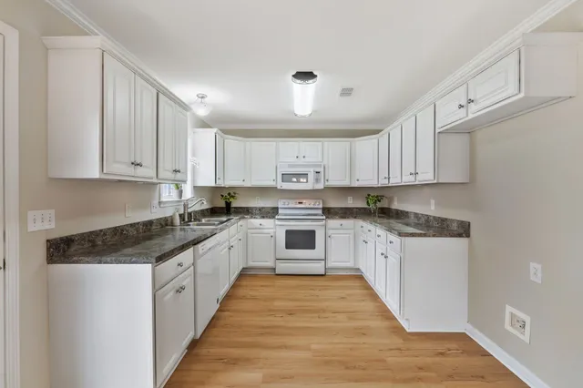 a large kitchen with cabinets