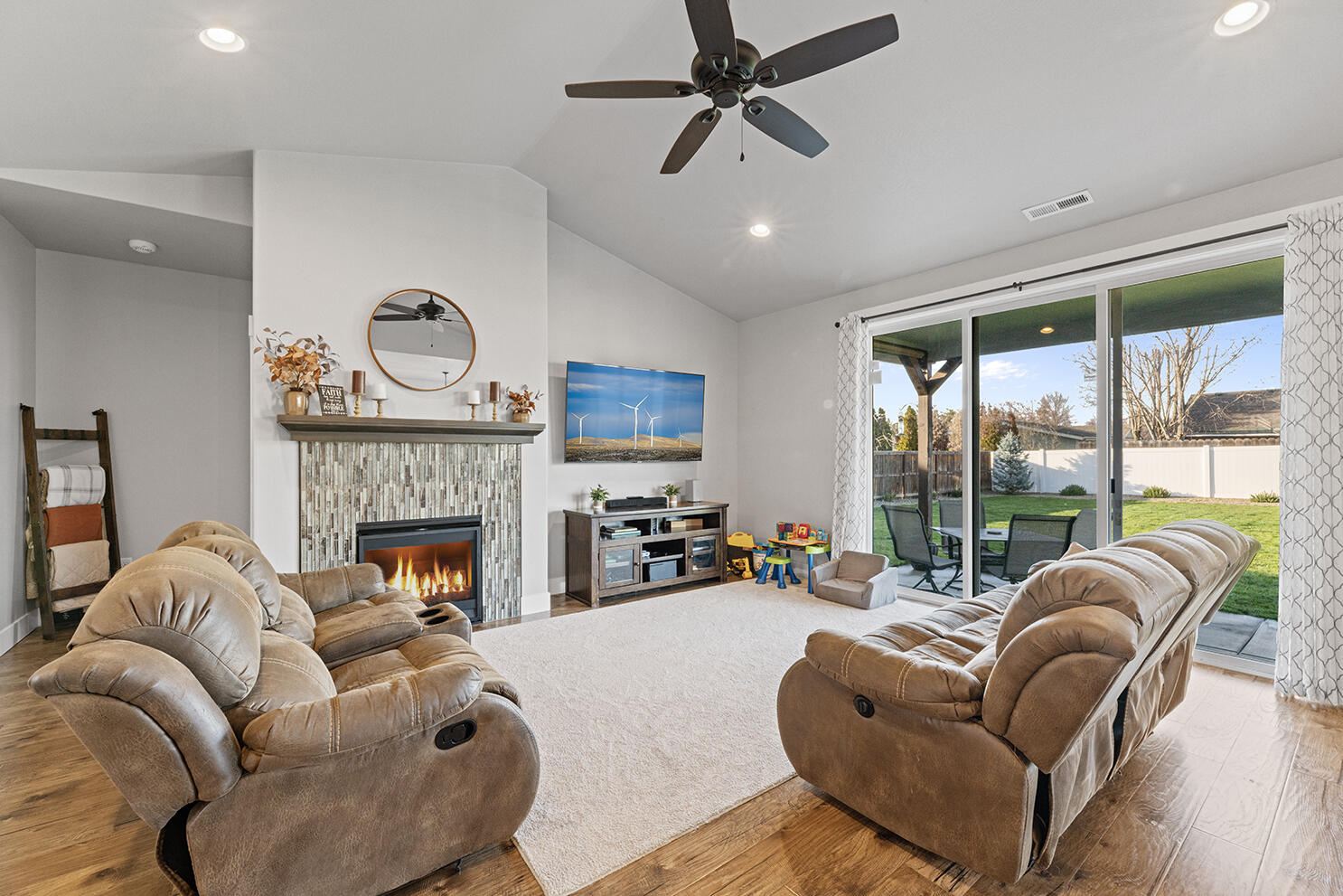 1043 Arrowhead Trail Eagle Point, OR 97524 - Photo 10 of 29 a living room with furniture fireplace and a large window