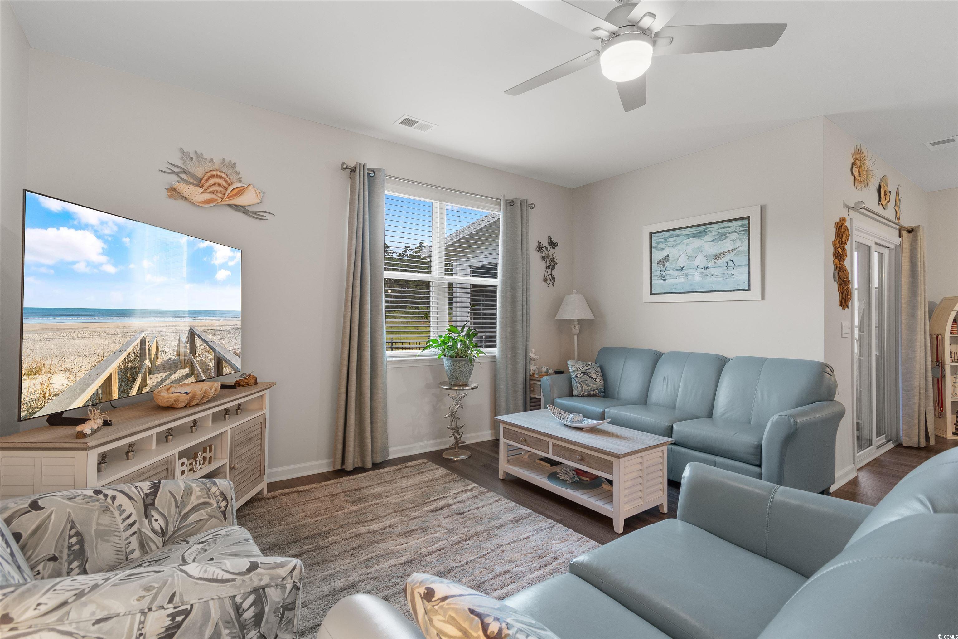 2438 Polaris Path Myrtle Beach, SC 29577 - Photo 12 of 40 Living room with wood finished floors and ceiling fan