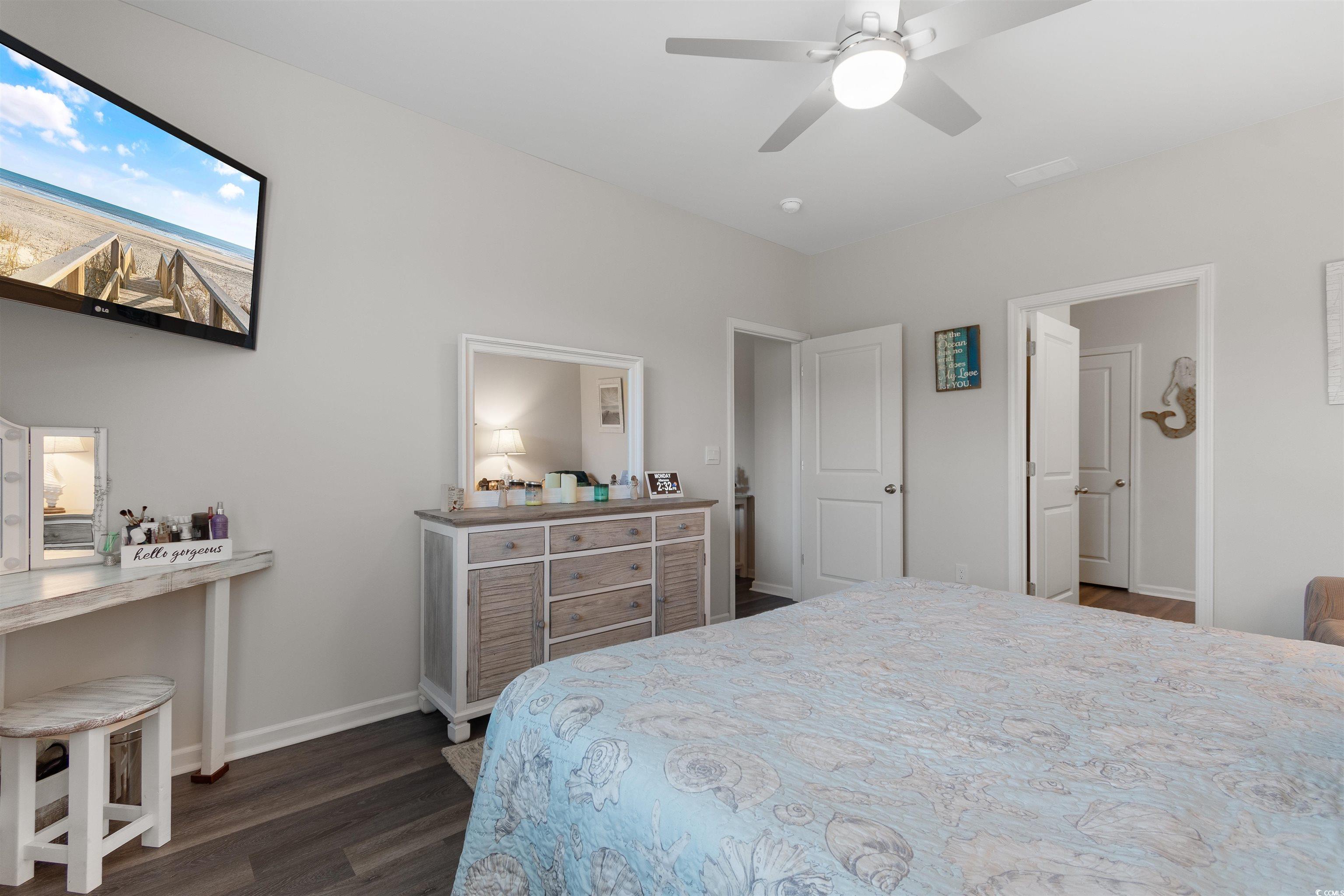 2438 Polaris Path Myrtle Beach, SC 29577 - Photo 15 of 40 Bedroom featuring dark wood-type flooring and a ceiling fan
