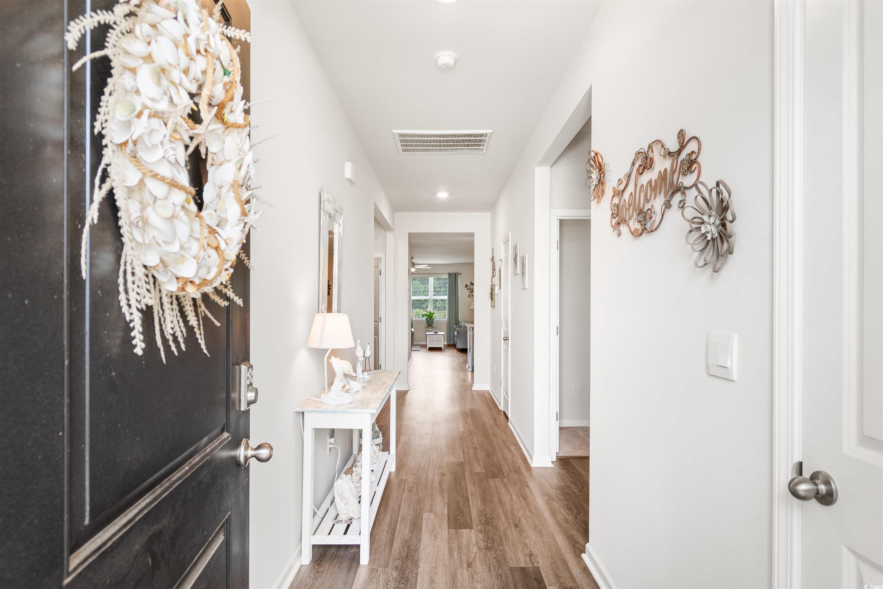 2438 Polaris Path Myrtle Beach, SC 29577 - Photo 2 of 40 Corridor featuring wood finished floors