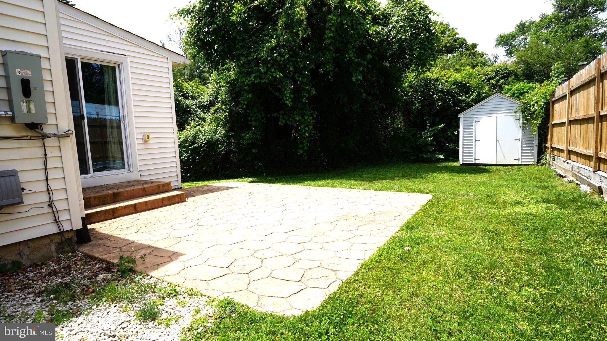 2006 Griffith Road Falls Church, VA 22043 - Photo 15 of 17 a backyard of a house with lots of green space