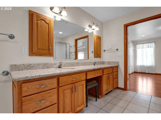 a kitchen view with a sink a stove and refrigerator