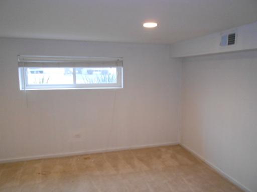 14 Highview Avenue Addison, IL 60101 - Photo 12 of 13 an empty room with a window