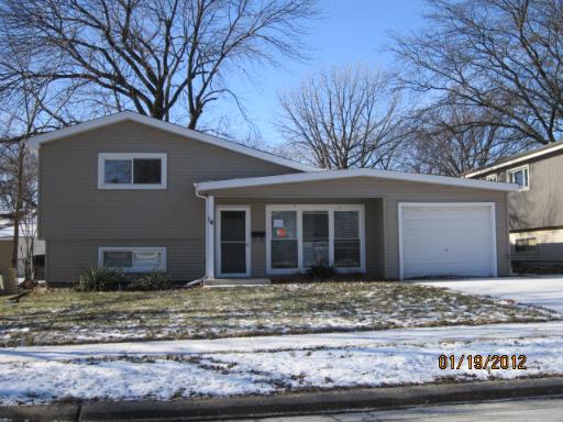 14 Highview Avenue Addison, IL 60101 - Photo 4 of 13 a front view of a house with a yard and garage