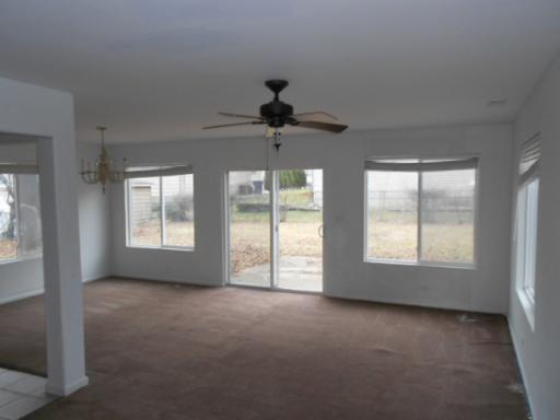 14 Highview Avenue Addison, IL 60101 - Photo 8 of 13 a view of an empty room with a window