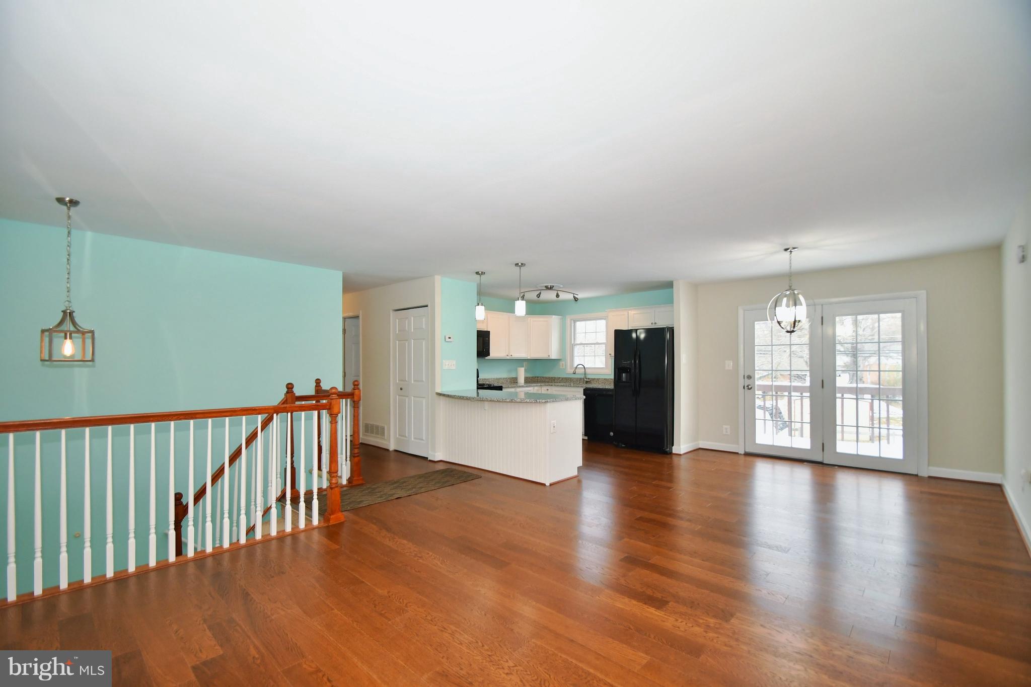 211 Chell Road Joppa, MD 21085 - Photo 2 of 38 Engineered hardwood floors- living room/ dining rm