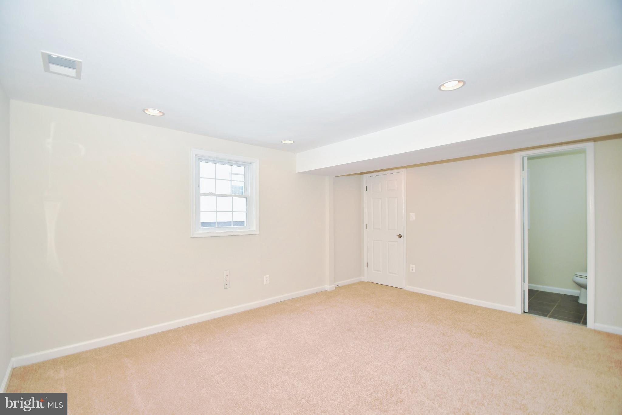 211 Chell Road Joppa, MD 21085 - Photo 22 of 38 Master Bedroom has neutral carpet and walls.
