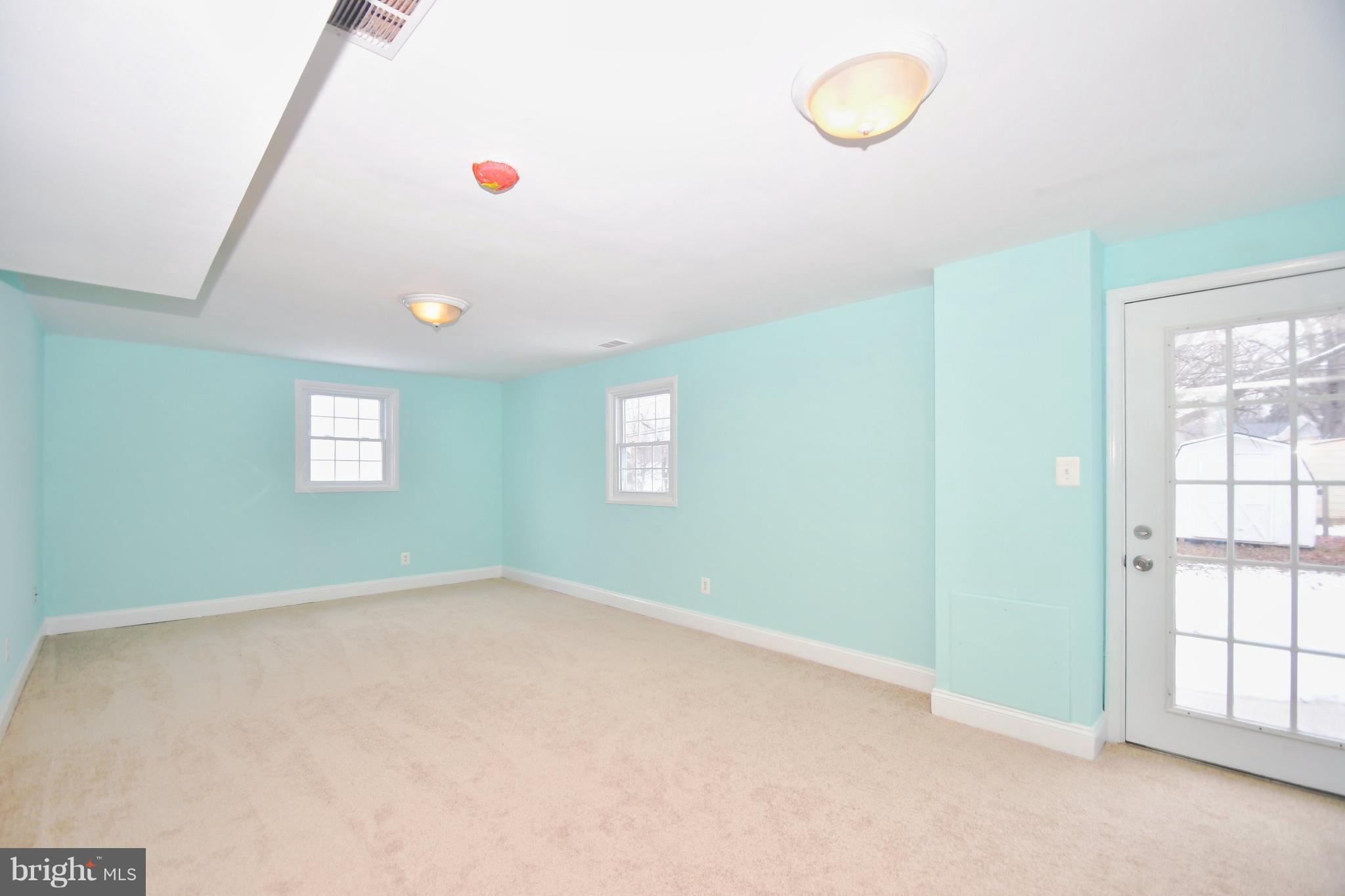 211 Chell Road Joppa, MD 21085 - Photo 26 of 38 Lower level walk-out Family room is 23' X 12,