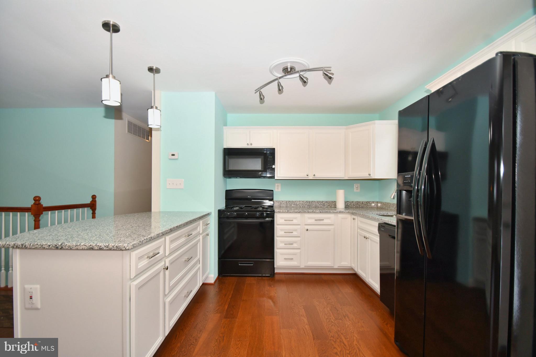211 Chell Road Joppa, MD 21085 - Photo 9 of 38 Step-saver Kitchen has all new appliances.