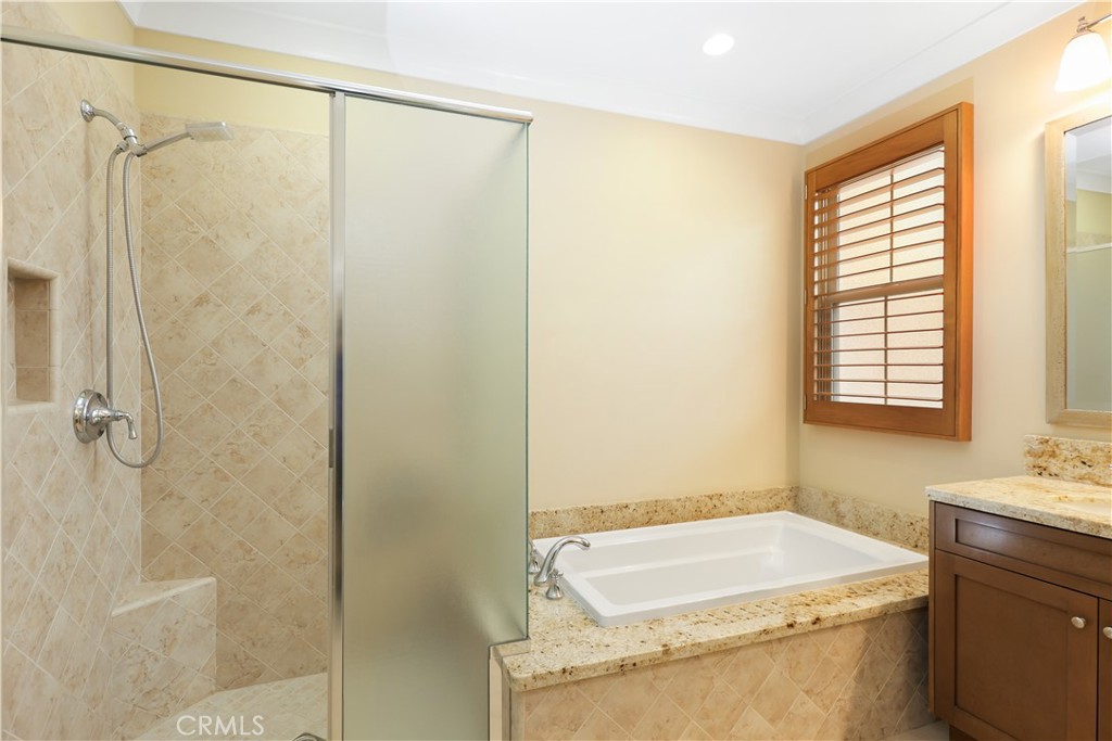 220 Kempton Irvine, CA 92620 - Photo 35 of 42 a bathroom with a sink and a shower