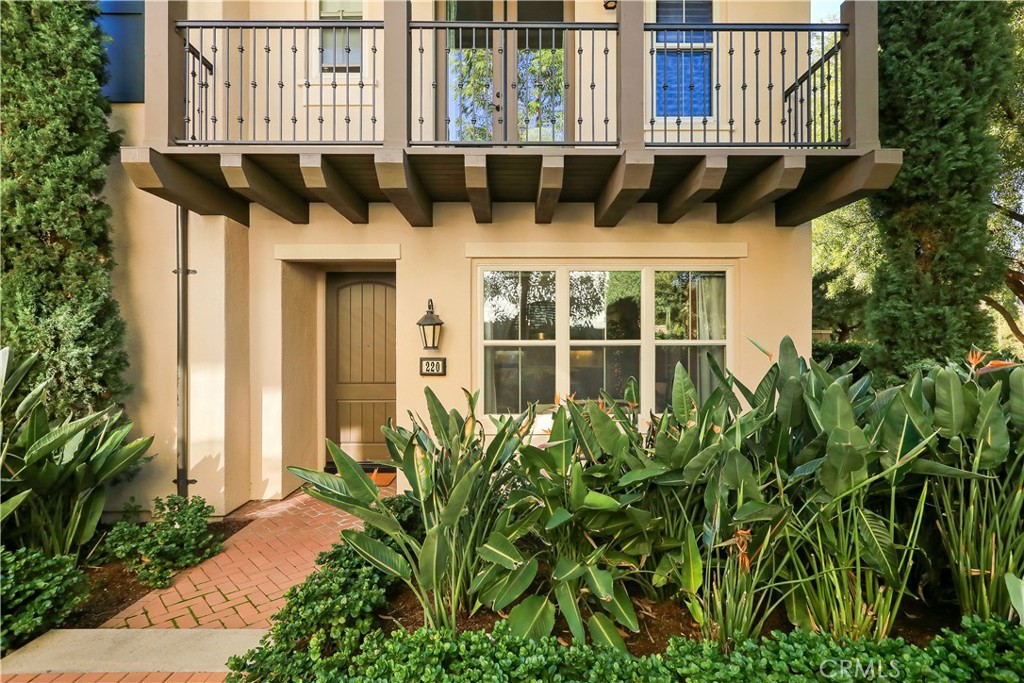 220 Kempton Irvine, CA 92620 - Photo 8 of 42 a front view of a building with a garden