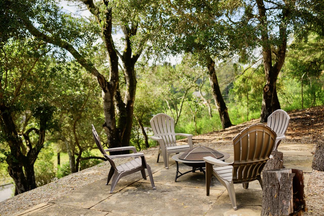155 Rabbits Run Road Santa Cruz, CA 95060 - Photo 5 of 113 a view of a chairs and table in the patio