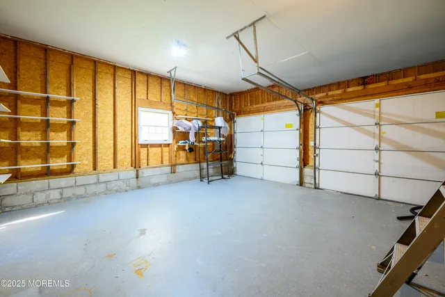 a view of an empty room with stairs
