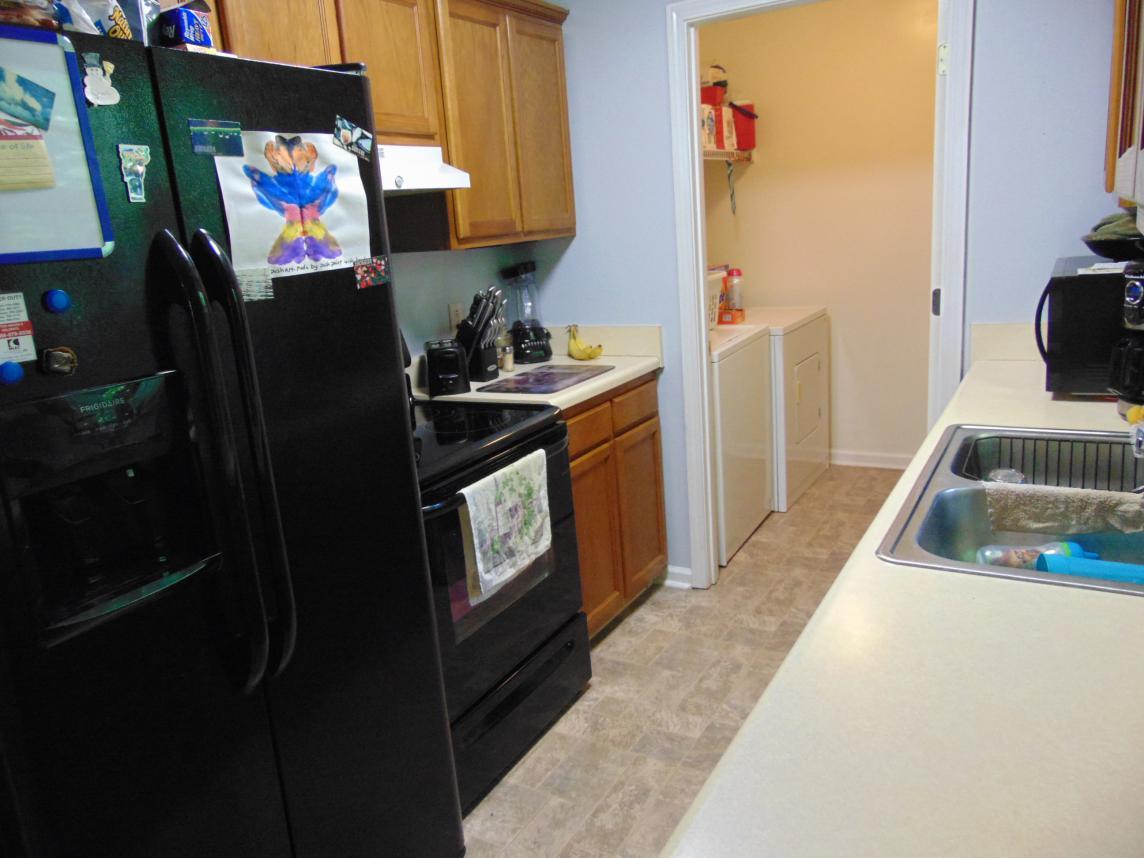 5577 Bell Branch Road Nunnelly, TN 37137 - Photo 13 of 30 KITCHEN INCLUDES STOVE, REFRIGERATOR, DISHWASHER,MICROWAVE