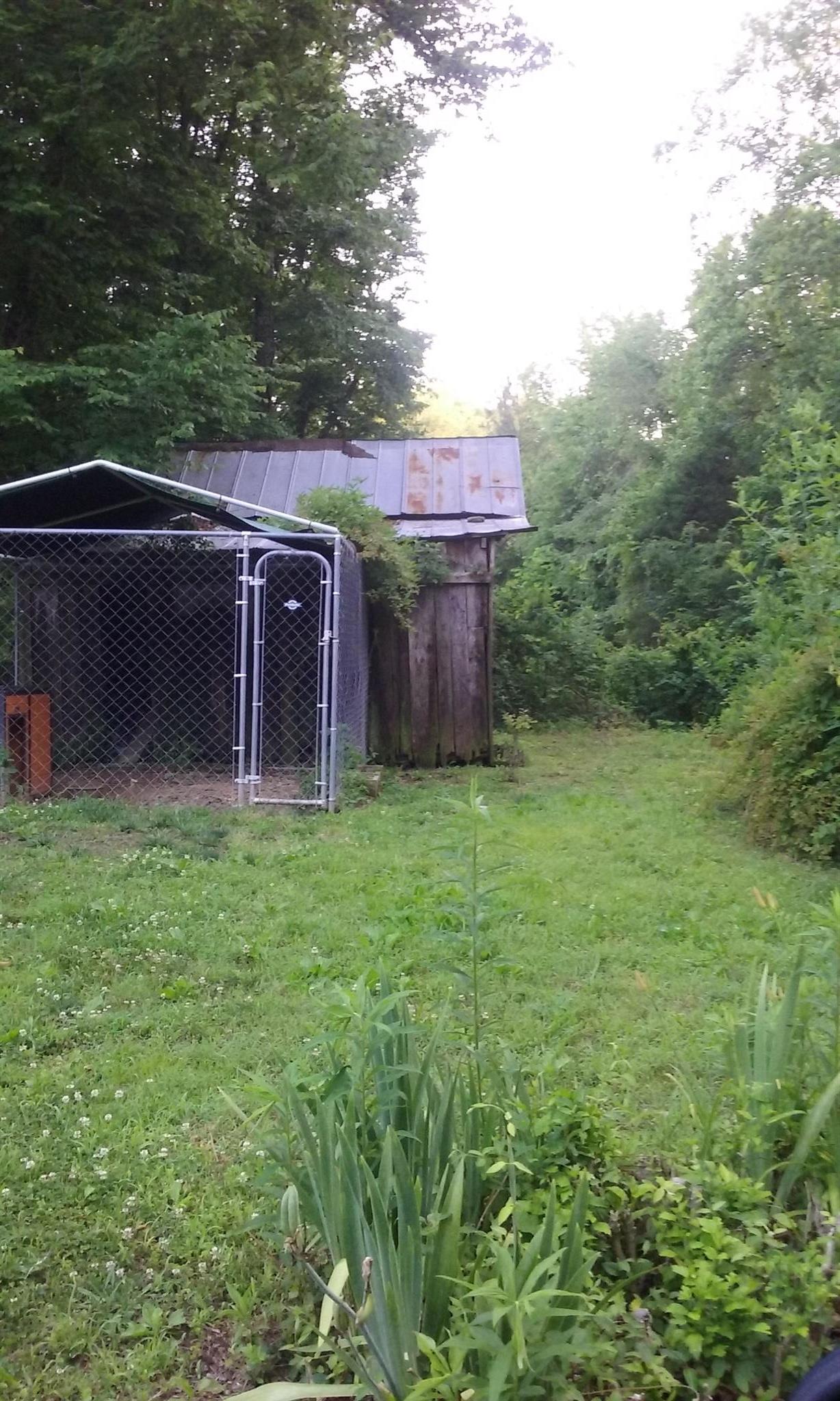 5577 Bell Branch Road Nunnelly, TN 37137 - Photo 5 of 30 Storage bldgs and fenced pen.